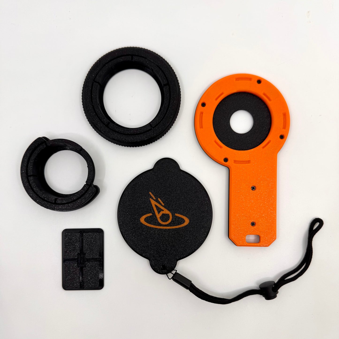 Camera lens and accessories on a white background